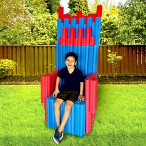 Child sitting in a pool chair made with LINK'EMS interlocking pool noodles